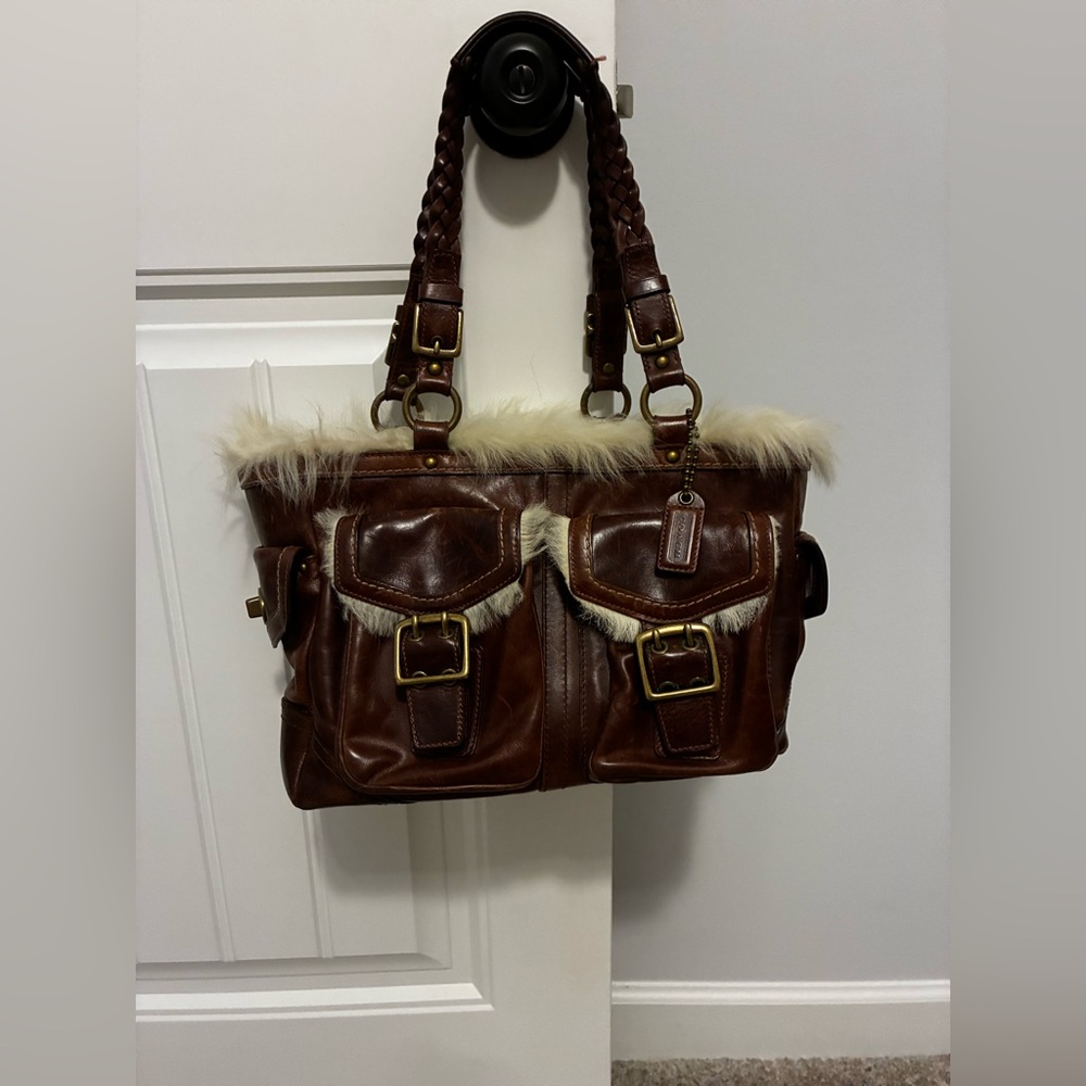 Brown Leather Coach bag with lamb 
Sterling.